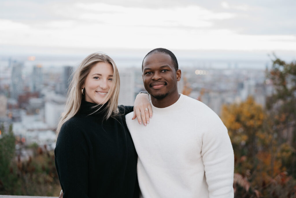 Montreal surprise proposal at Mont Royal with the couple celebrating their engagement